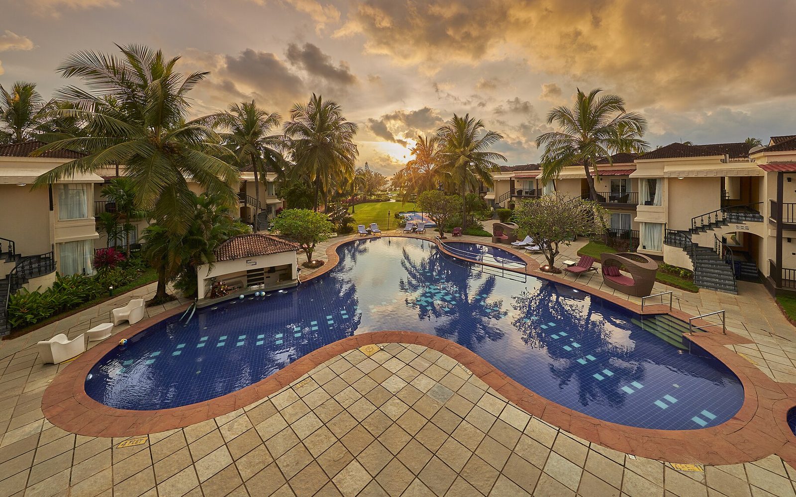 Poolside at a Goan resort — Goa Family Holiday — Beaches, Boats & Old Goa