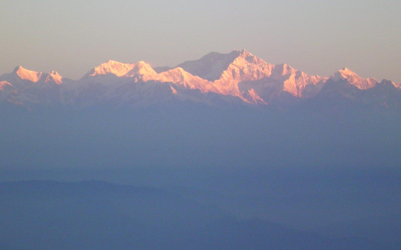 Sunrise over the Kanchenjunga range seen from the Sikkim-Darjeeling hills