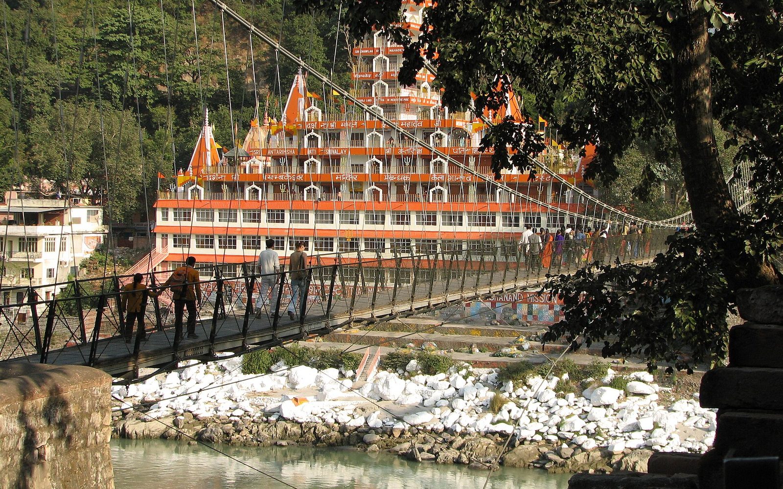 Ganga river and suspension bridge at Rishikesh — Rishikesh Adventure — Rafting, Cliff Jumps & Ganga Camps